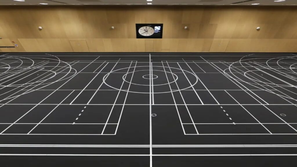 O que parecia comum virou tecnologia: como o chão da NBA virou uma tela colorida controlada por tablet