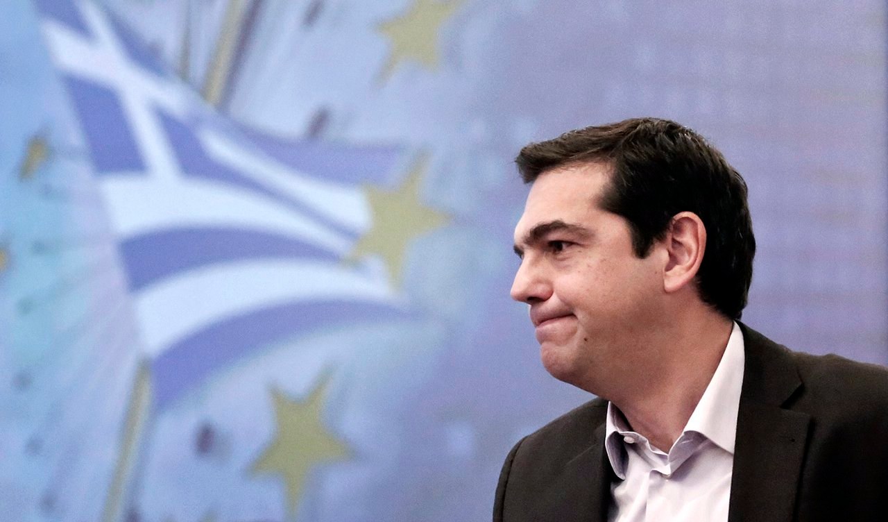 Alexis Tsipras, head of the anti-bailout Syriza party, speaks during a financial conference in Athens on Tuesday, Dec. 2, 2014. Tsipras said that Greece’s battered economy could not recover unless the money owed to other Eurozone country’s was cut signif