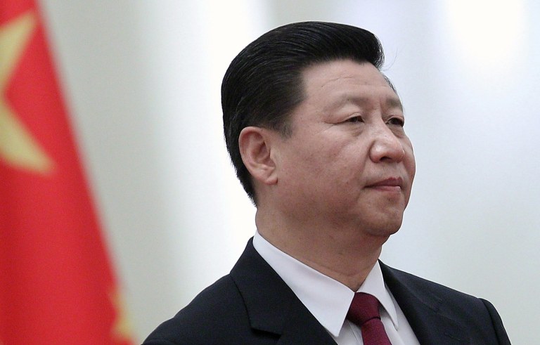 (FILES) This file photo taken on September 28, 2011 shows Chinese Vice President Xi Jinping taking part in a ceremony at the Great Hall of the People in Beijing. A health scare was the likely reason for the unexplained absence of Xi Jinping, as secrecy s