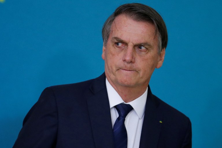 Brazil's President Jair Bolsonaro attends a ceremony for the presentation of the 2nd phase of the advertising campaign of the pension reform bill at the Planalto Palace in Brasilia, Brazil May 20, 2019. REUTERS/Adriano Machado