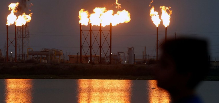 Flames emerge from flare stacks at Nahr Bin Umar oil field, north of Basra, Iraq September 16, 2019. REUTERS/Essam Al-Sudani - RC1F6B230B80