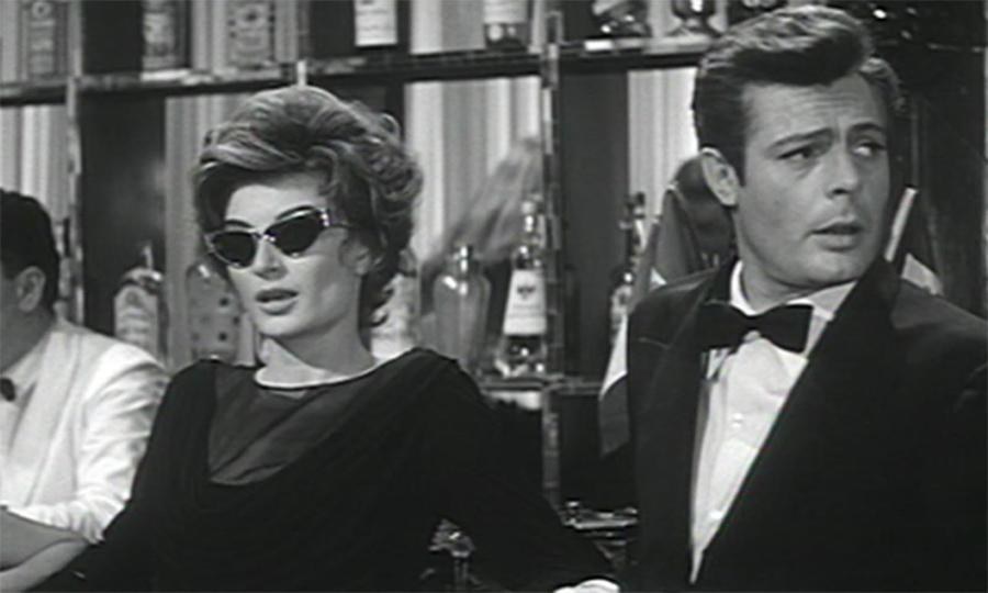 Marcello (Marcello Mastroianni) e Maddalena (Anouk Aimée) em La Dolce Vita, impossivelmente chiques e cool, são como a Última Mulher e o Último Homem antes do dilúvio do "espalhafato vulgar"