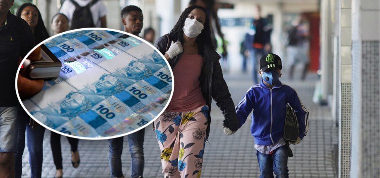 Pessoas caminham utilizando máscaras de proteção no Rio de Janeiro (RJ)