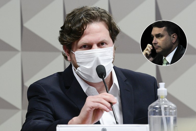 O diretor de relações institucionais da Precisa Medicamentos, Danilo Trento, e o senador Flávio Bolsonaro