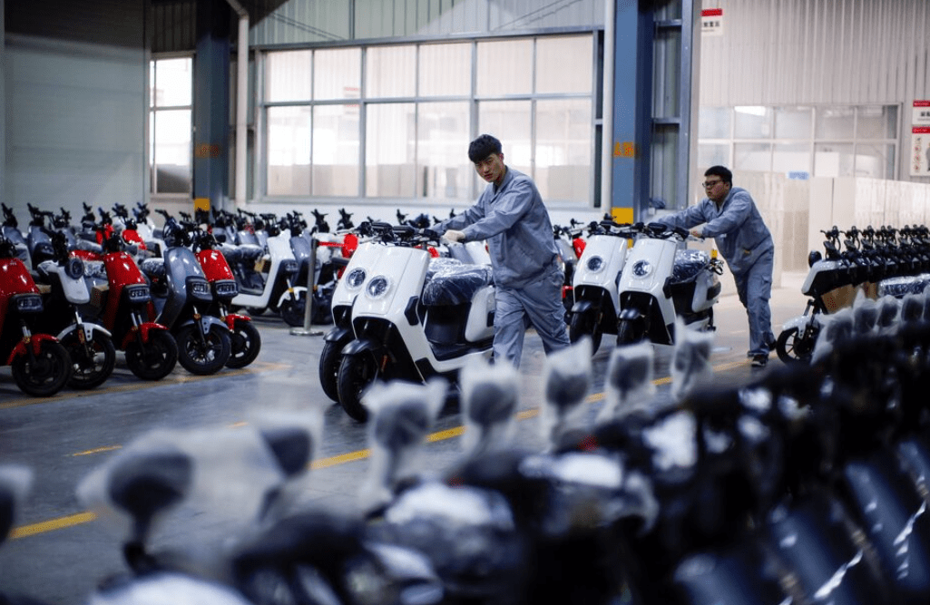 Motos elétricas da NIU Technologies são exibidos em uma conferência de imprensa em Changzhou, província de Jiangsu, China